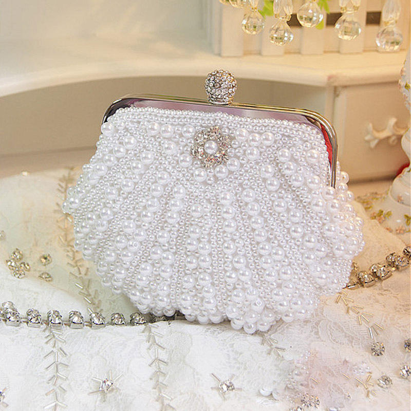 Luxury Scalloped Pearl Clutch  - Luxury Bags Direct のレビューと価格